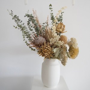 Proteas and Banksia with Euc in white – A Little Bit Floral