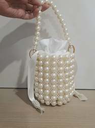 Jewellery manufacturing: Bianca - lustrous pearls bucket bag with satin drawstring inner