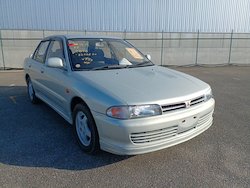 Car dealer - new and/or used: Mitsubishi Lancer GSR - 1994